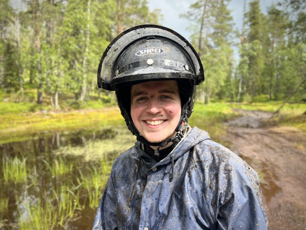 Guests riding ATVs on a guided safari through the forests of Ruka–Kuusamo, Finland.